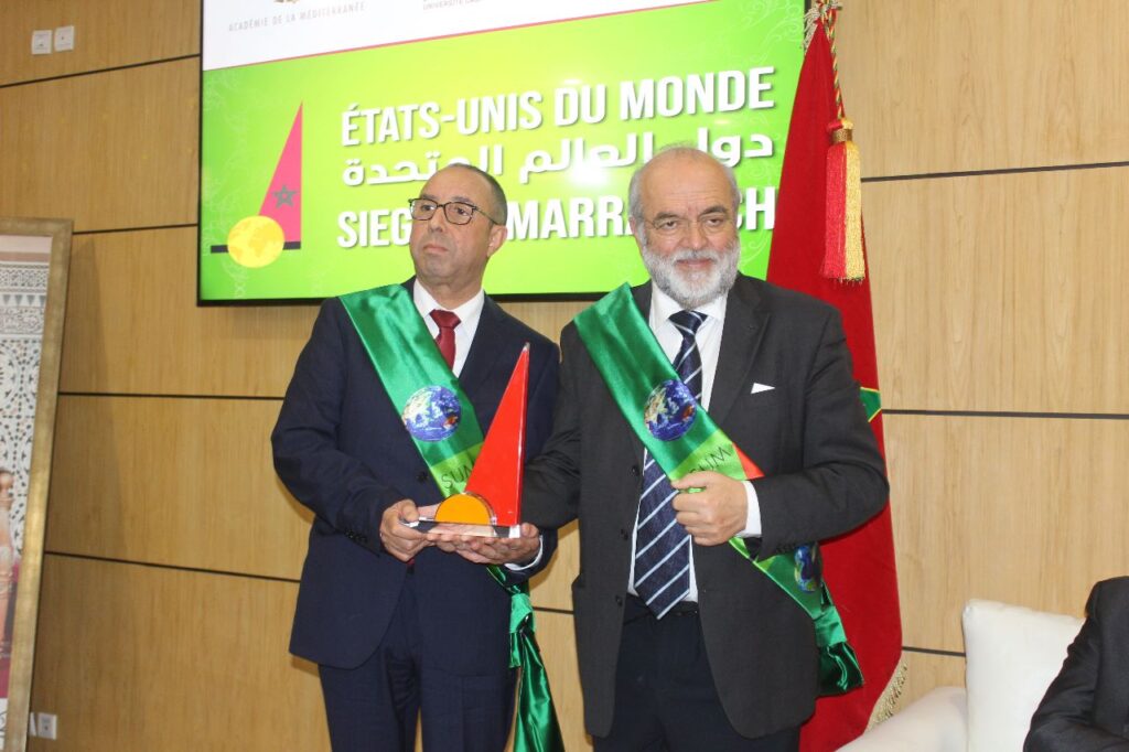 بالصور … اعلان جامعة القاضي عياض مقرا لدول العالم المتحدة وكاباسو يوشح رئيس الجامعة بوسام المساهمة والتميز